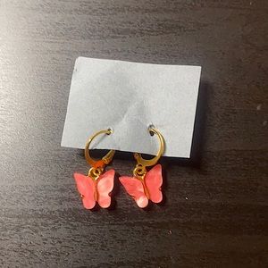 Homemade pink butterfly earrings